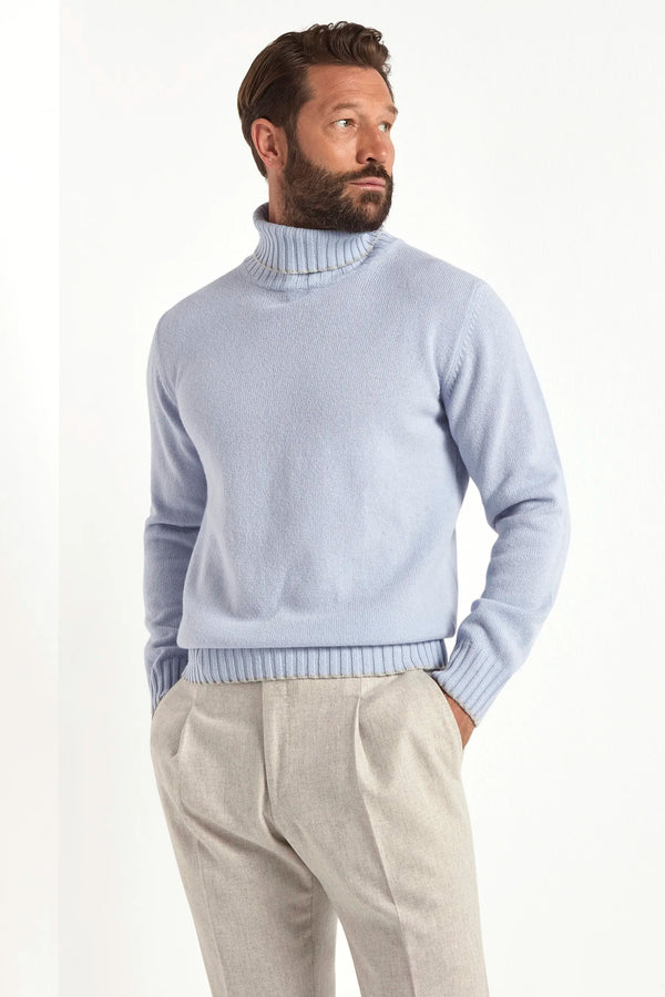 light blue wool turtleneck, italian style, made in italy, fine wool turtleneck, luxury wool sweater, elegant winter knitwear, refined menswear turtleneck, premium italian sweater, versatile layering turtleneck, tailored wool turtleneck, breathable winter sweater, soft wool knitwear, upscale wool sweater, italian craftsmanship turtleneck, polished winter knit, classic light blue turtleneck, timeless italian sweater, sophisticated wool knit, cozy winter wool sweater, lightweight wool turtleneck