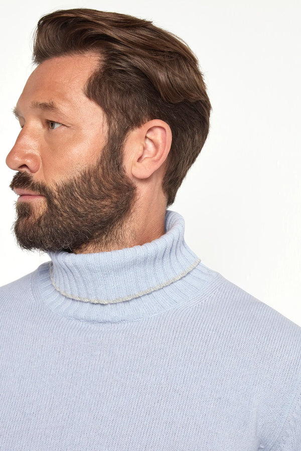 light blue wool turtleneck, italian style, made in italy, fine wool turtleneck, luxury wool sweater, elegant winter knitwear, refined menswear turtleneck, premium italian sweater, versatile layering turtleneck, tailored wool turtleneck, breathable winter sweater, soft wool knitwear, upscale wool sweater, italian craftsmanship turtleneck, polished winter knit, classic light blue turtleneck, timeless italian sweater, sophisticated wool knit, cozy winter wool sweater, lightweight wool turtleneck