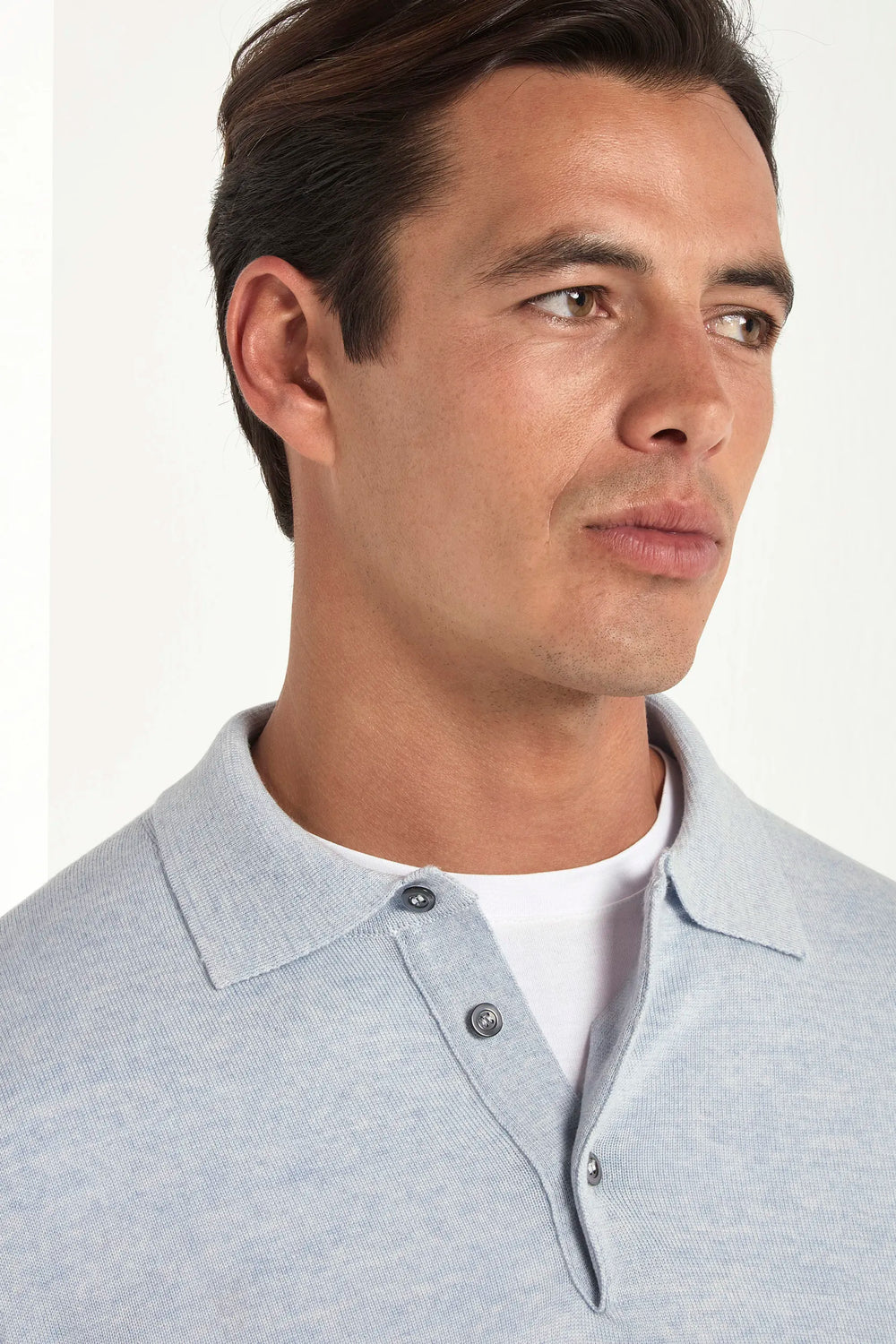 merino wool polo, light blue polo, italian style, made in italy, 100% merino wool polo, lightweight knit polo, luxury knit polo, elegant polo shirt, refined menswear polo, premium italian knitwear, smart casual polo, versatile winter layering, fine merino polo, tailored fit polo, breathable wool polo, soft merino knit polo, upscale polo shirt, italian craftsmanship polo, winter polo layering, polished knit polo