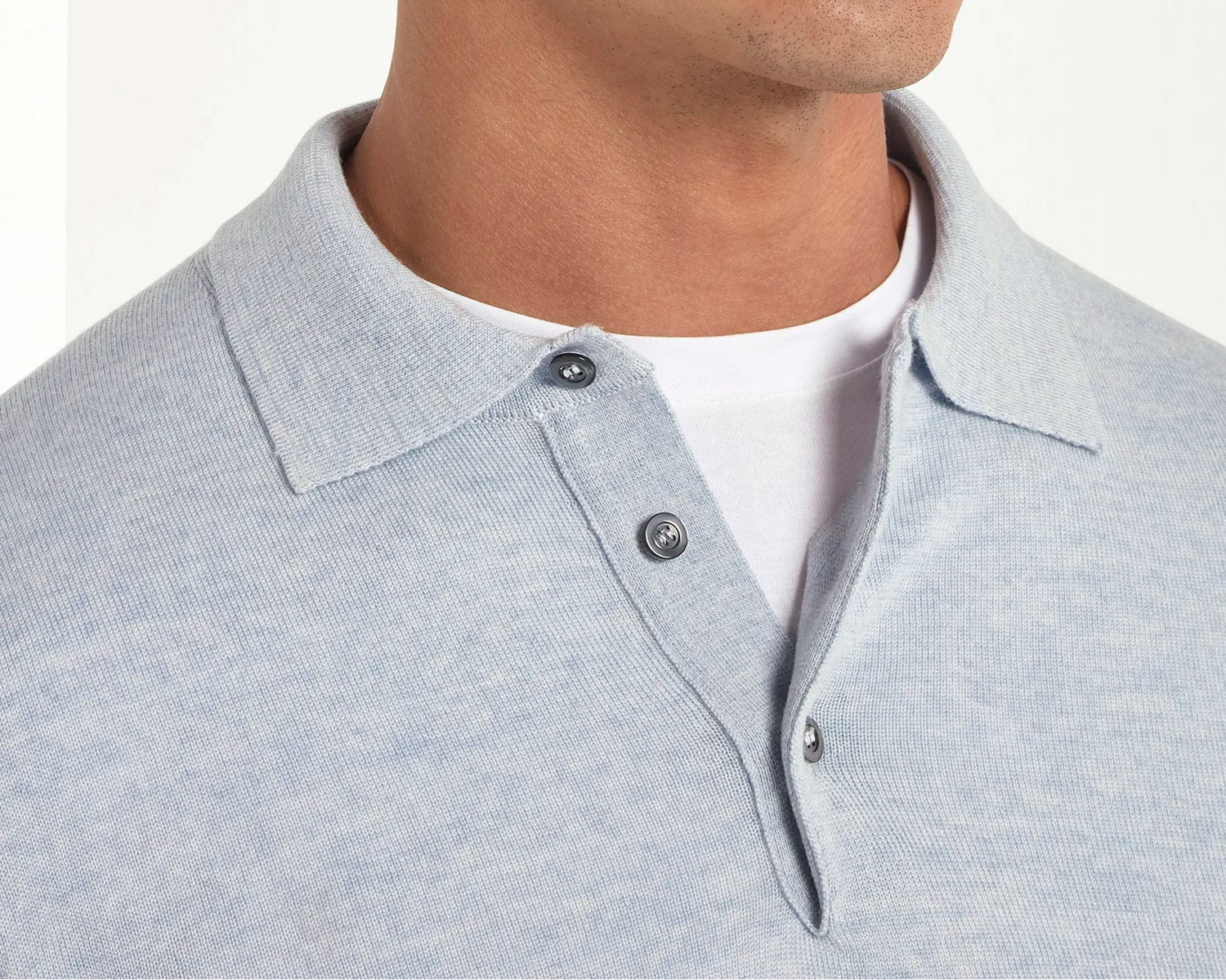 merino wool polo, light blue polo, italian style, made in italy, 100% merino wool polo, lightweight knit polo, luxury knit polo, elegant polo shirt, refined menswear polo, premium italian knitwear, smart casual polo, versatile winter layering, fine merino polo, tailored fit polo, breathable wool polo, soft merino knit polo, upscale polo shirt, italian craftsmanship polo, winter polo layering, polished knit polo