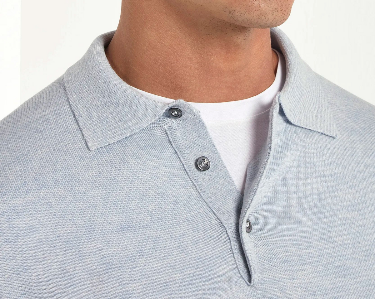 merino wool polo, light blue polo, italian style, made in italy, 100% merino wool polo, lightweight knit polo, luxury knit polo, elegant polo shirt, refined menswear polo, premium italian knitwear, smart casual polo, versatile winter layering, fine merino polo, tailored fit polo, breathable wool polo, soft merino knit polo, upscale polo shirt, italian craftsmanship polo, winter polo layering, polished knit polo