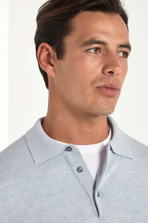 merino wool polo, light blue polo, italian style, made in italy, 100% merino wool polo, lightweight knit polo, luxury knit polo, elegant polo shirt, refined menswear polo, premium italian knitwear, smart casual polo, versatile winter layering, fine merino polo, tailored fit polo, breathable wool polo, soft merino knit polo, upscale polo shirt, italian craftsmanship polo, winter polo layering, polished knit polo
