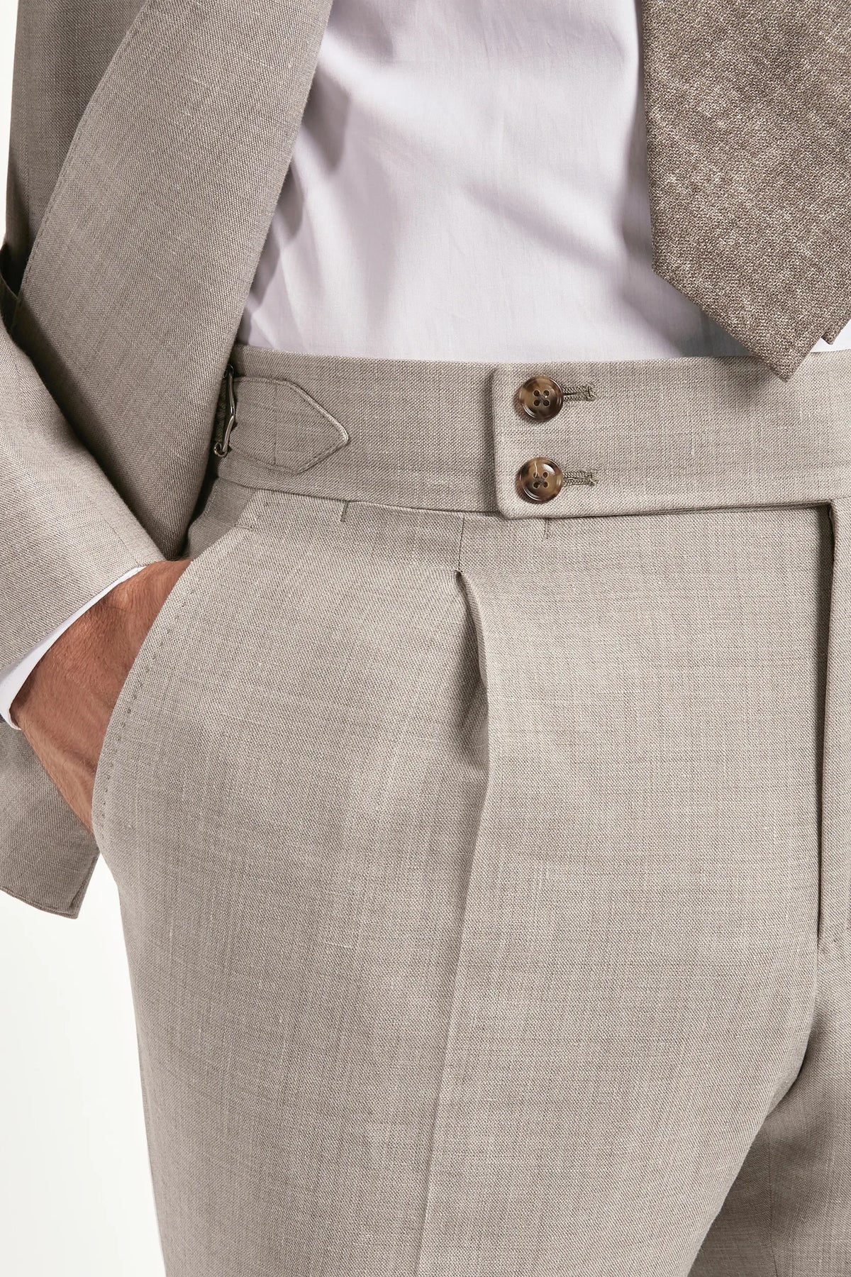 sand men's suit, men's sand suit, italian summer suit, sand wool silk linen suit, luxury men's suit, elegant men's tailoring, refined sand suit, tailored lightweight suit, premium italian suit, sophisticated men's suit, timeless italian tailoring, upscale men's suit, classic sand suit, italian craftsmanship suit, premium wool silk linen suit, refined italian suit