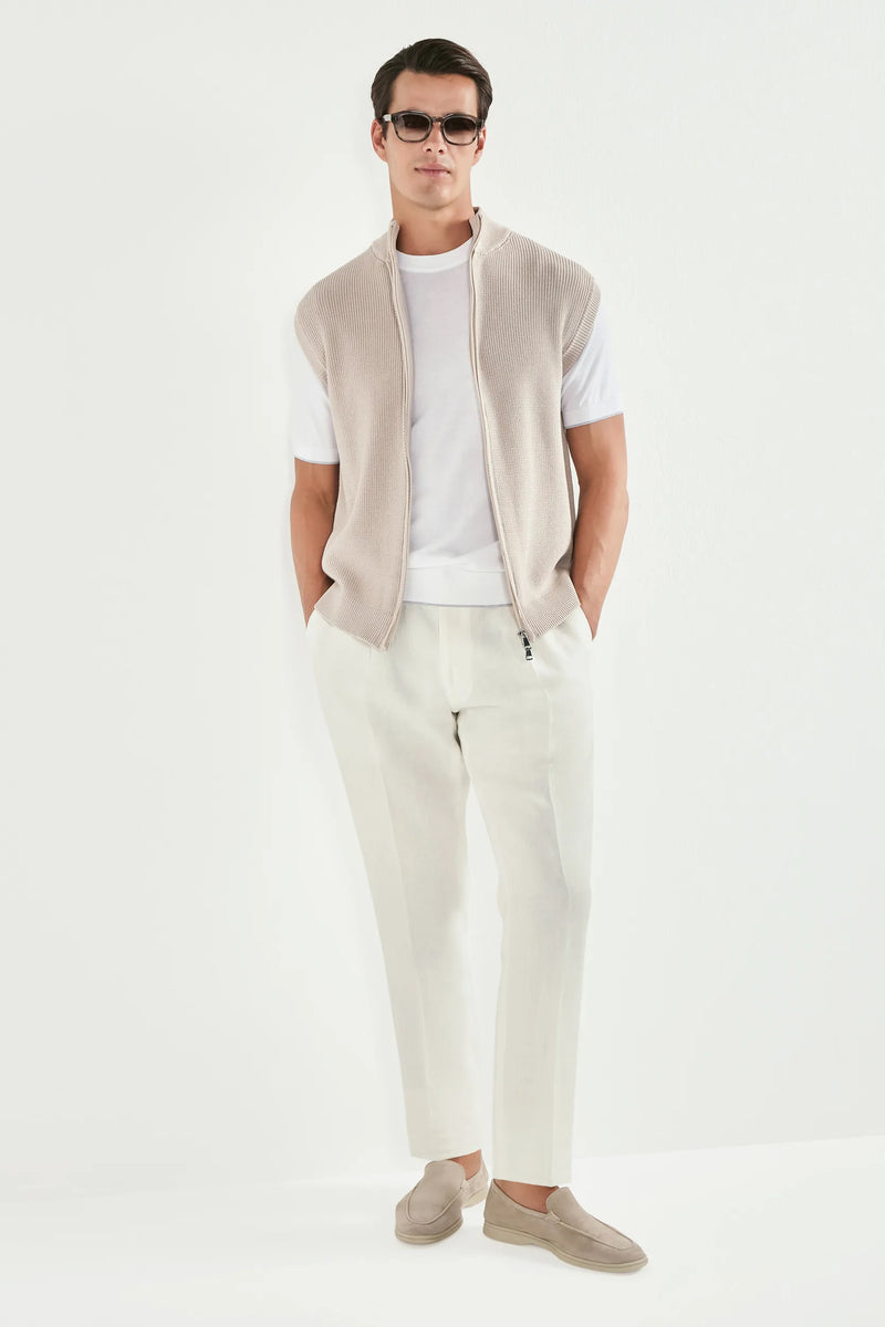 beige knitted vest, men's beige vest, italian knit vest, beige sleeveless knit, luxury men's vest, elegant men's knitwear, refined knitted vest, tailored beige vest, premium italian vest, sophisticated men's knitwear, timeless italian vest, upscale men's sleeveless knit, classic beige vest, italian craftsmanship knit, premium men's knitted vest, refined italian knitwear