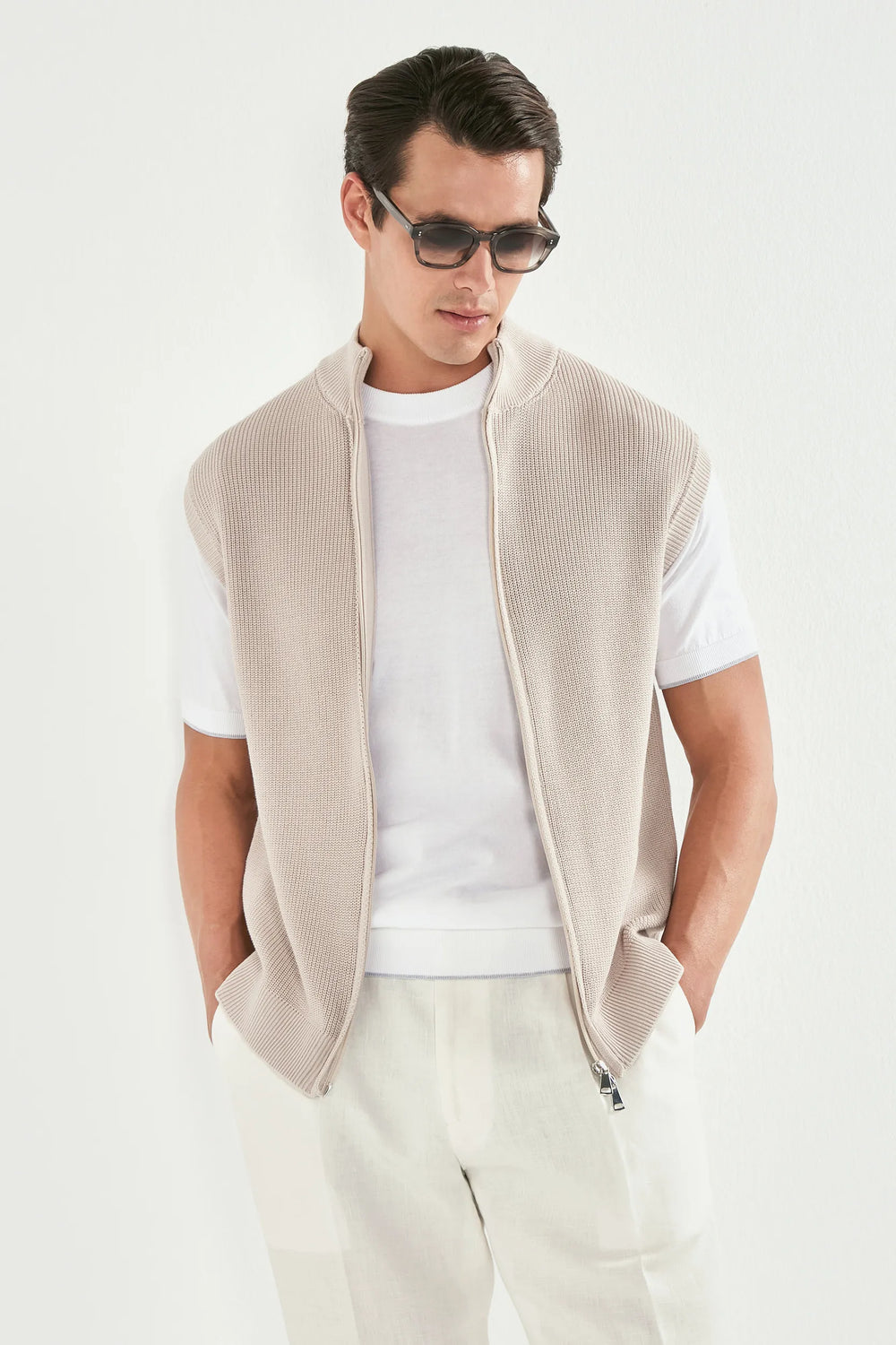 beige knitted vest, men's beige vest, italian knit vest, beige sleeveless knit, luxury men's vest, elegant men's knitwear, refined knitted vest, tailored beige vest, premium italian vest, sophisticated men's knitwear, timeless italian vest, upscale men's sleeveless knit, classic beige vest, italian craftsmanship knit, premium men's knitted vest, refined italian knitwear