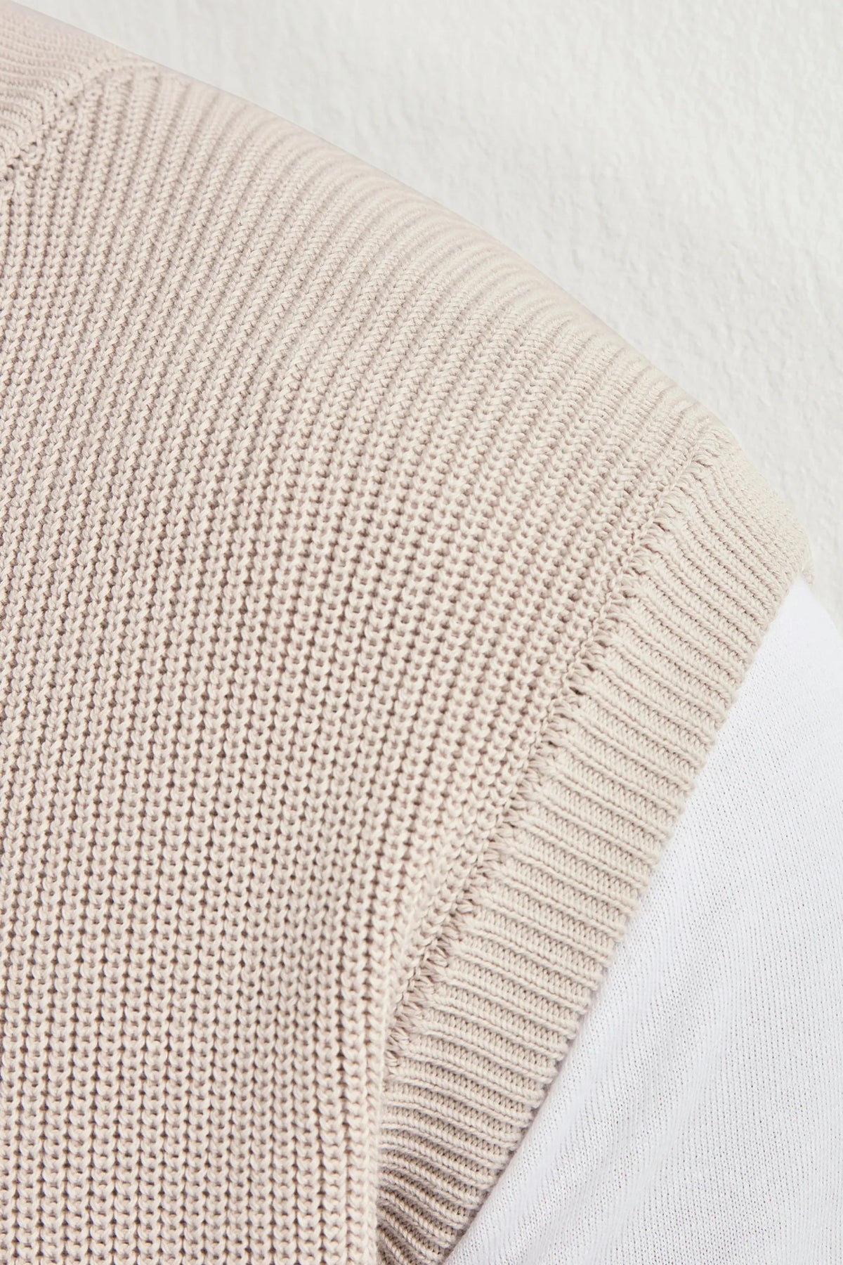 beige knitted vest, men's beige vest, italian knit vest, beige sleeveless knit, luxury men's vest, elegant men's knitwear, refined knitted vest, tailored beige vest, premium italian vest, sophisticated men's knitwear, timeless italian vest, upscale men's sleeveless knit, classic beige vest, italian craftsmanship knit, premium men's knitted vest, refined italian knitwear