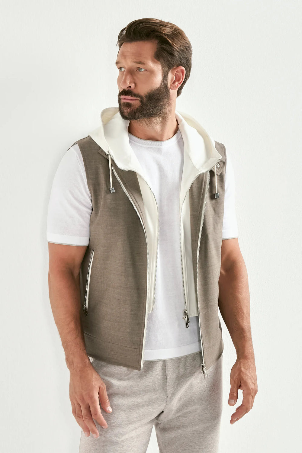 tobacco hooded vest, men's brown vest, italian hooded vest, tobacco sleeveless jacket, luxury men's outerwear, elegant men's vest, refined hooded vest, tailored tobacco vest, premium italian vest, sophisticated men's outerwear, timeless italian vest, upscale men's hooded vest, classic tobacco vest, italian craftsmanship vest, premium men's sleeveless vest, refined italian hooded vest