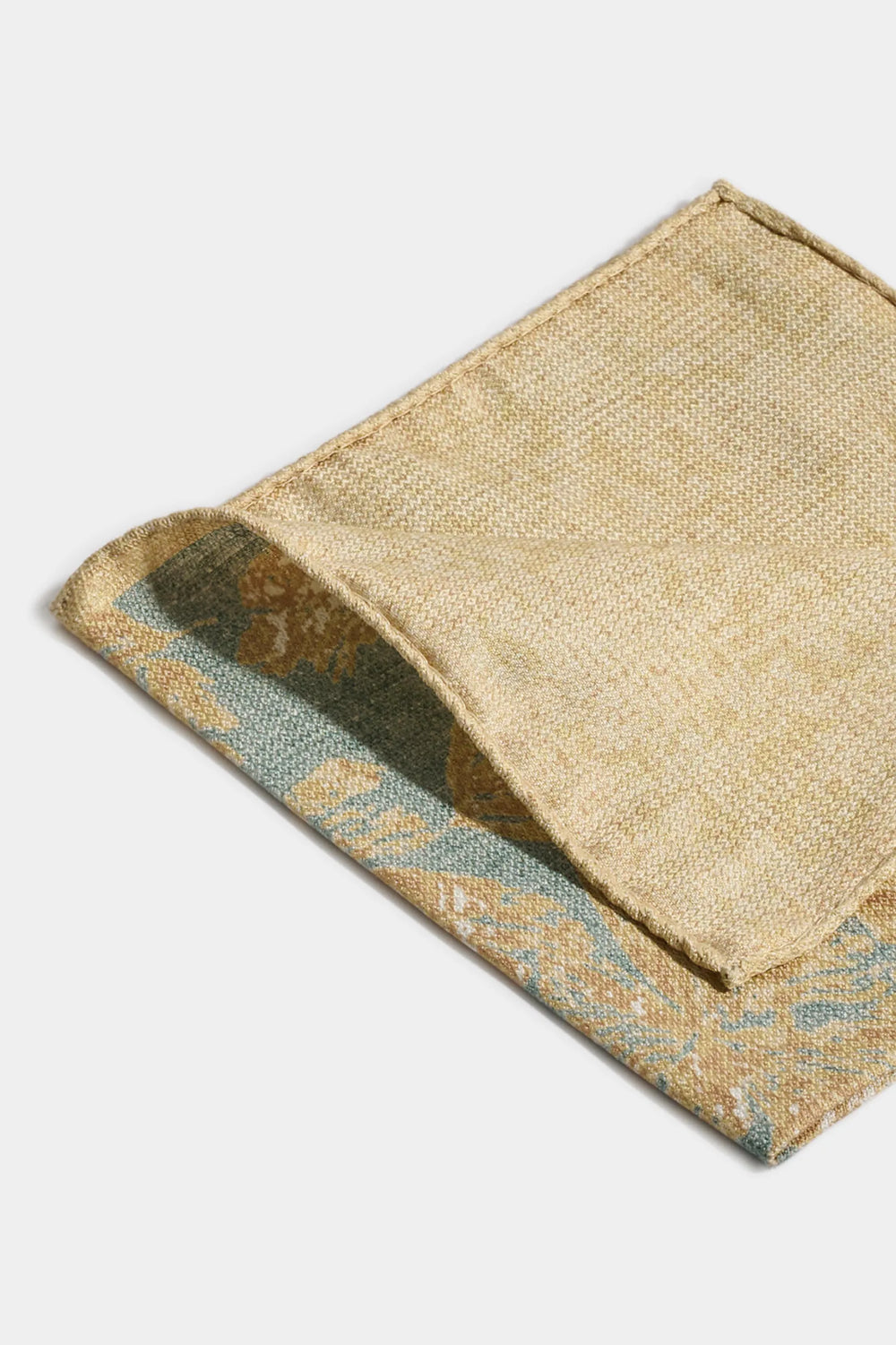 Textured woven fabric with a geometric pattern on a white background