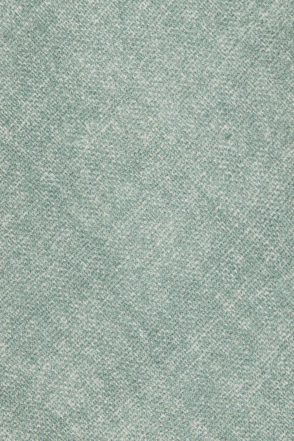 Textured green fabric pattern