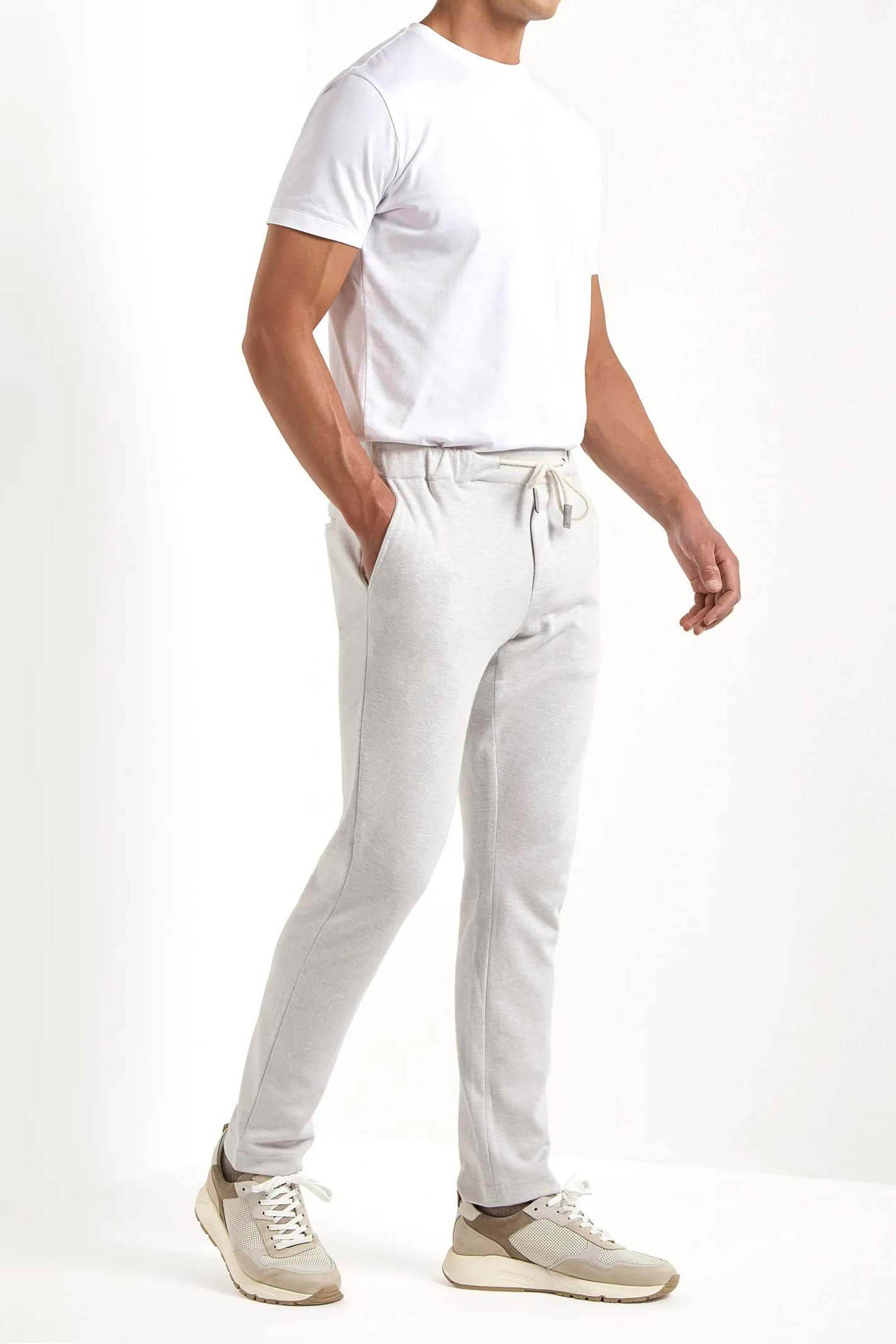 stone jersey jogger pants, men jersey jogger pants, italian jersey jogger pants, stone wool jogger pants, luxury men's jersey jogger pants, elegant men's jogger pants, refined jersey jogger pants, tailored stone jogger pants, premium italian jogger pants, sophisticated men's jersey jogger pants, timeless italian jogger pants, upscale men's jersey jogger pants, classic stone jersey jogger pants, italian craftsmanship jogger pants, premium men's stone joggers, refined italian wool jogger pants
