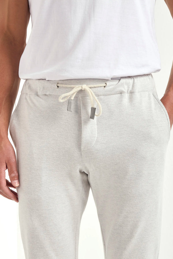 stone jersey jogger pants, men jersey jogger pants, italian jersey jogger pants, stone wool jogger pants, luxury men's jersey jogger pants, elegant men's jogger pants, refined jersey jogger pants, tailored stone jogger pants, premium italian jogger pants, sophisticated men's jersey jogger pants, timeless italian jogger pants, upscale men's jersey jogger pants, classic stone jersey jogger pants, italian craftsmanship jogger pants, premium men's stone joggers, refined italian wool jogger pants