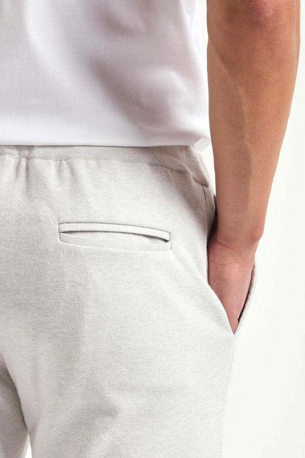 stone jersey jogger pants, men jersey jogger pants, italian jersey jogger pants, stone wool jogger pants, luxury men's jersey jogger pants, elegant men's jogger pants, refined jersey jogger pants, tailored stone jogger pants, premium italian jogger pants, sophisticated men's jersey jogger pants, timeless italian jogger pants, upscale men's jersey jogger pants, classic stone jersey jogger pants, italian craftsmanship jogger pants, premium men's stone joggers, refined italian wool jogger pants