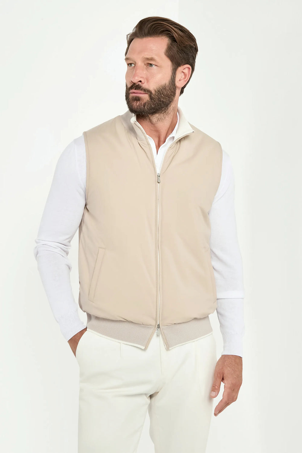 taupe nylon vest, men's taupe vest, italian nylon vest, taupe sleeveless jacket, luxury men's vest, elegant men's outerwear, refined nylon vest, tailored taupe vest, premium italian vest, sophisticated men's vest, timeless italian vest, upscale men's nylon vest, classic taupe vest, italian craftsmanship vest, premium men's sleeveless vest, refined italian nylon vest