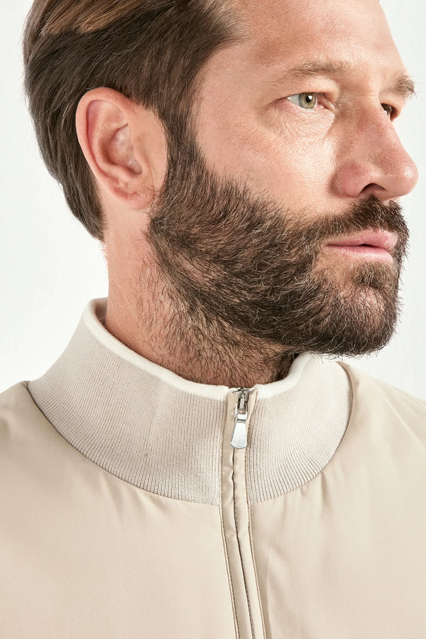 taupe nylon vest, men's taupe vest, italian nylon vest, taupe sleeveless jacket, luxury men's vest, elegant men's outerwear, refined nylon vest, tailored taupe vest, premium italian vest, sophisticated men's vest, timeless italian vest, upscale men's nylon vest, classic taupe vest, italian craftsmanship vest, premium men's sleeveless vest, refined italian nylon vest