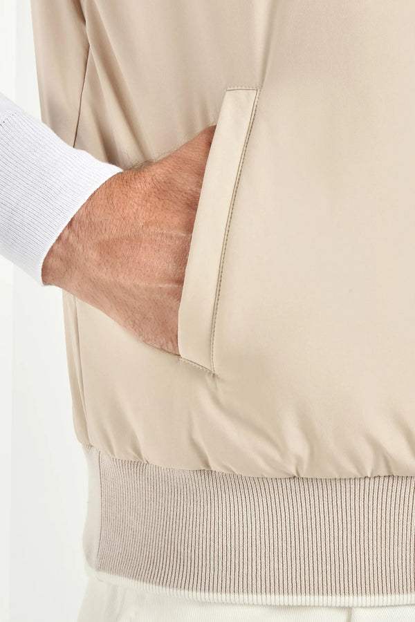 taupe nylon vest, men's taupe vest, italian nylon vest, taupe sleeveless jacket, luxury men's vest, elegant men's outerwear, refined nylon vest, tailored taupe vest, premium italian vest, sophisticated men's vest, timeless italian vest, upscale men's nylon vest, classic taupe vest, italian craftsmanship vest, premium men's sleeveless vest, refined italian nylon vest