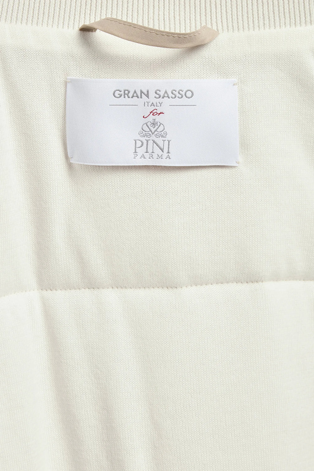 taupe nylon vest, men's taupe vest, italian nylon vest, taupe sleeveless jacket, luxury men's vest, elegant men's outerwear, refined nylon vest, tailored taupe vest, premium italian vest, sophisticated men's vest, timeless italian vest, upscale men's nylon vest, classic taupe vest, italian craftsmanship vest, premium men's sleeveless vest, refined italian nylon vest