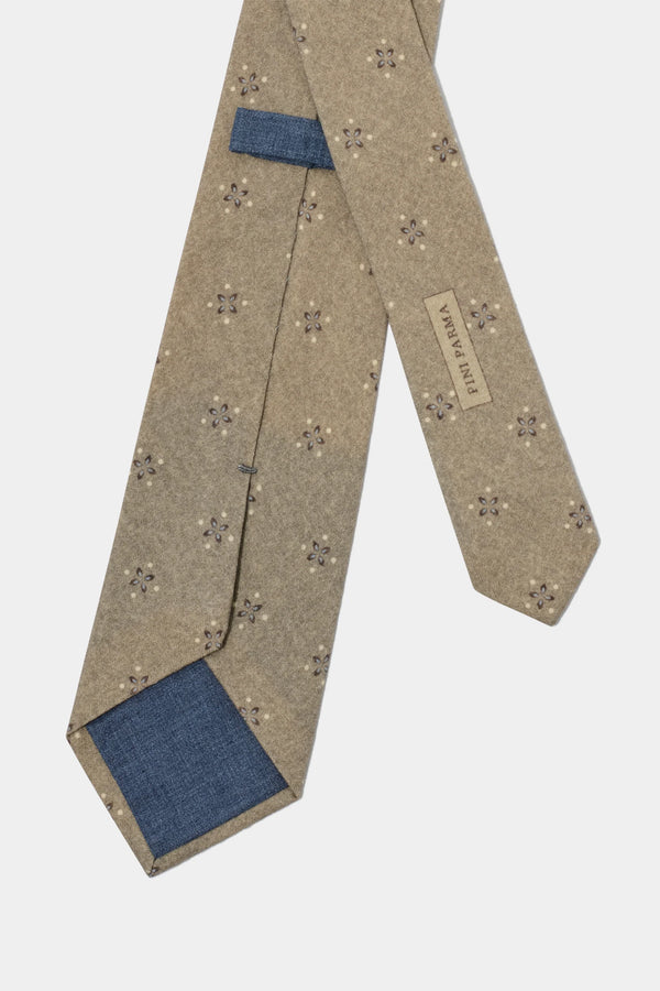 taupe patterned tie, men's patterned tie, italian silk tie, taupe silk tie, luxury men's tie, elegant men's tie, refined patterned tie, tailored taupe tie, premium italian tie, sophisticated men's tie, timeless italian silk tie, upscale men's tie, classic taupe tie, italian craftsmanship tie, premium men's silk tie, refined italian patterned tie