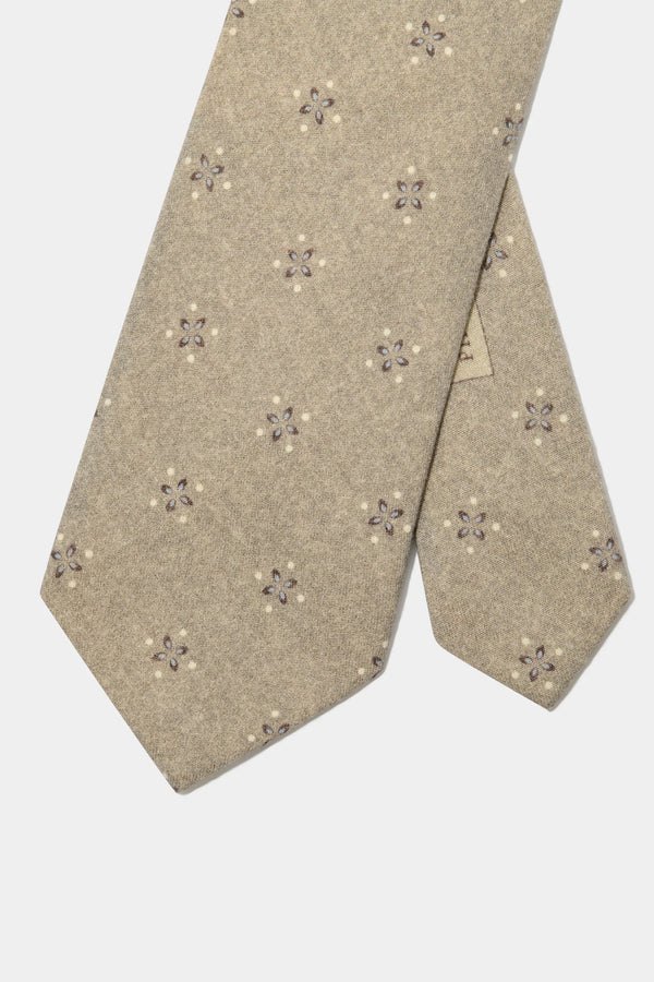 taupe patterned tie, men's patterned tie, italian silk tie, taupe silk tie, luxury men's tie, elegant men's tie, refined patterned tie, tailored taupe tie, premium italian tie, sophisticated men's tie, timeless italian silk tie, upscale men's tie, classic taupe tie, italian craftsmanship tie, premium men's silk tie, refined italian patterned tie