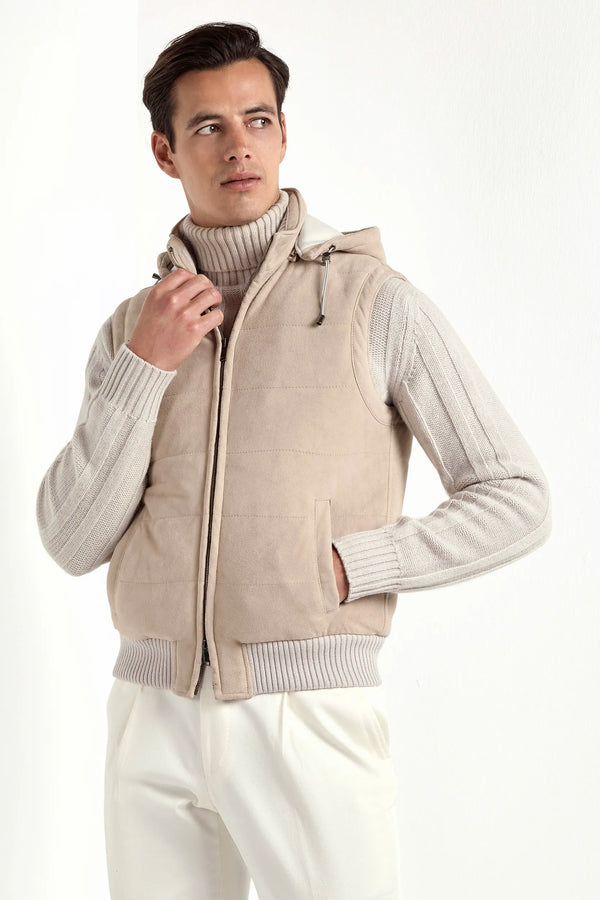 taupe suede padded vest, men's suede vest, italian suede vest, taupe padded vest, luxury men's vest, elegant men's vest, refined suede vest, tailored taupe vest, premium italian vest, sophisticated men's vest, timeless italian suede vest, upscale men's vest, classic taupe vest, italian craftsmanship vest, premium men's suede vest, refined italian padded vest