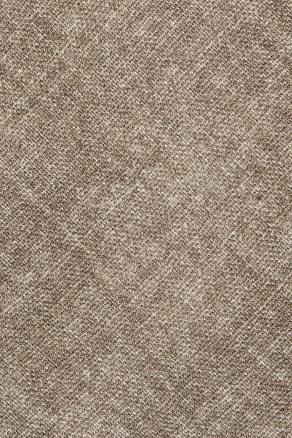 Close-up of a textured brown fabric surface