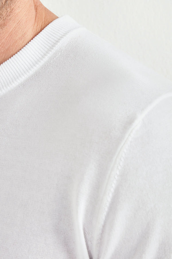 white high neck t-shirt, men's white t-shirt, italian cotton t-shirt, white mock neck t-shirt, luxury men's t-shirt, elegant men's t-shirt, refined cotton t-shirt, tailored white t-shirt, premium italian t-shirt, sophisticated men's top, timeless italian t-shirt, upscale men's t-shirt, classic white t-shirt, italian craftsmanship t-shirt, premium men's high neck t-shirt, refined italian t-shirt