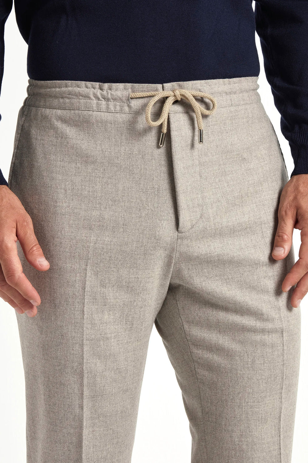 beige flannel drawstring trousers, italian style, made in italy, wool flannel trousers, luxury casual trousers, elegant drawstring pants, tailored flannel trousers, premium italian trousers, versatile wool trousers, refined menswear trousers, winter drawstring trousers, soft flannel trousers, relaxed fit wool trousers, upscale casual trousers, italian craftsmanship trousers, polished drawstring trousers, classic beige flannel trousers, sophisticated winter trousers, comfortable wool trousers, timeless itali