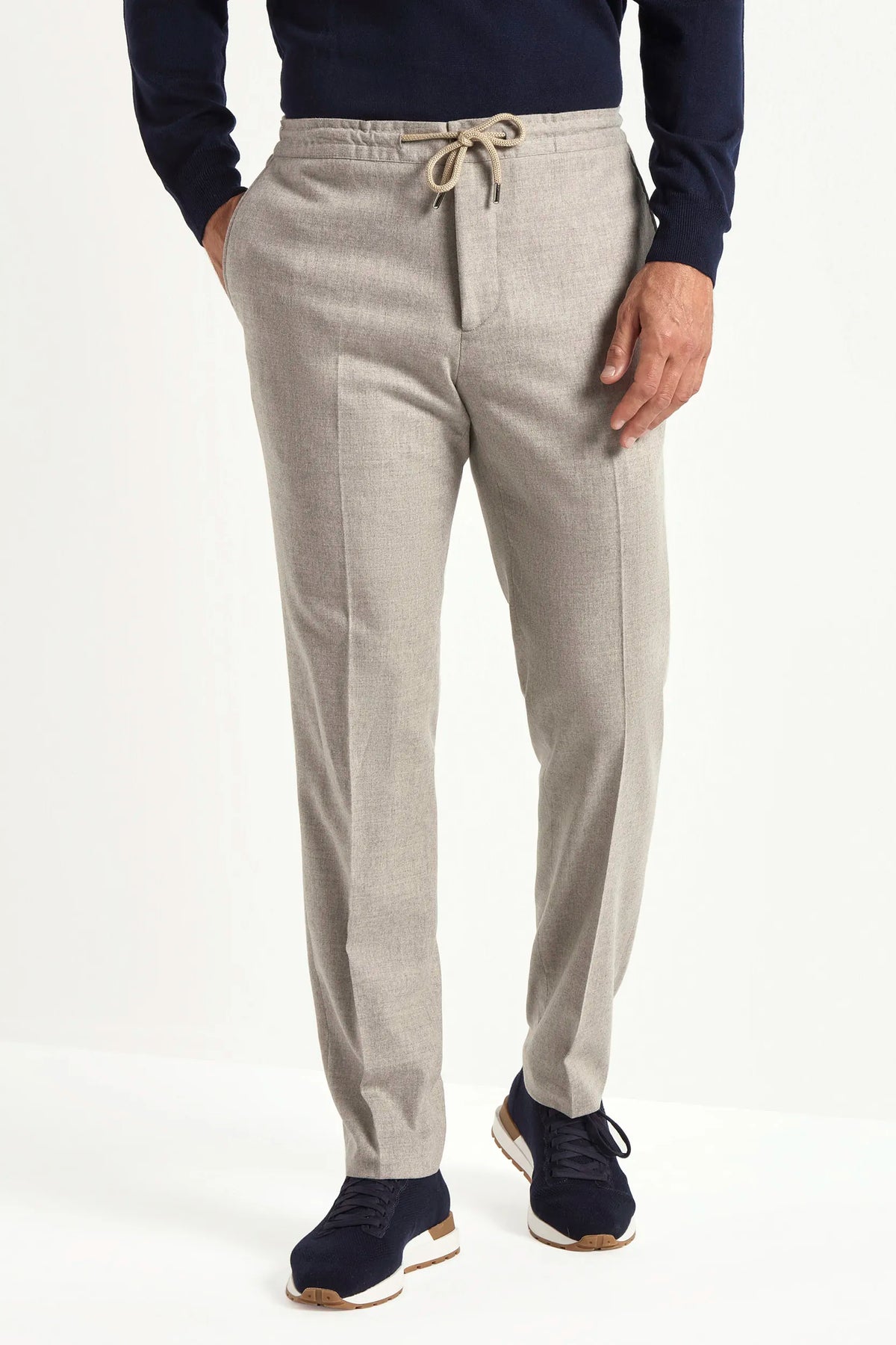 beige flannel drawstring trousers, italian style, made in italy, wool flannel trousers, luxury casual trousers, elegant drawstring pants, tailored flannel trousers, premium italian trousers, versatile wool trousers, refined menswear trousers, winter drawstring trousers, soft flannel trousers, relaxed fit wool trousers, upscale casual trousers, italian craftsmanship trousers, polished drawstring trousers, classic beige flannel trousers, sophisticated winter trousers, comfortable wool trousers, timeless itali