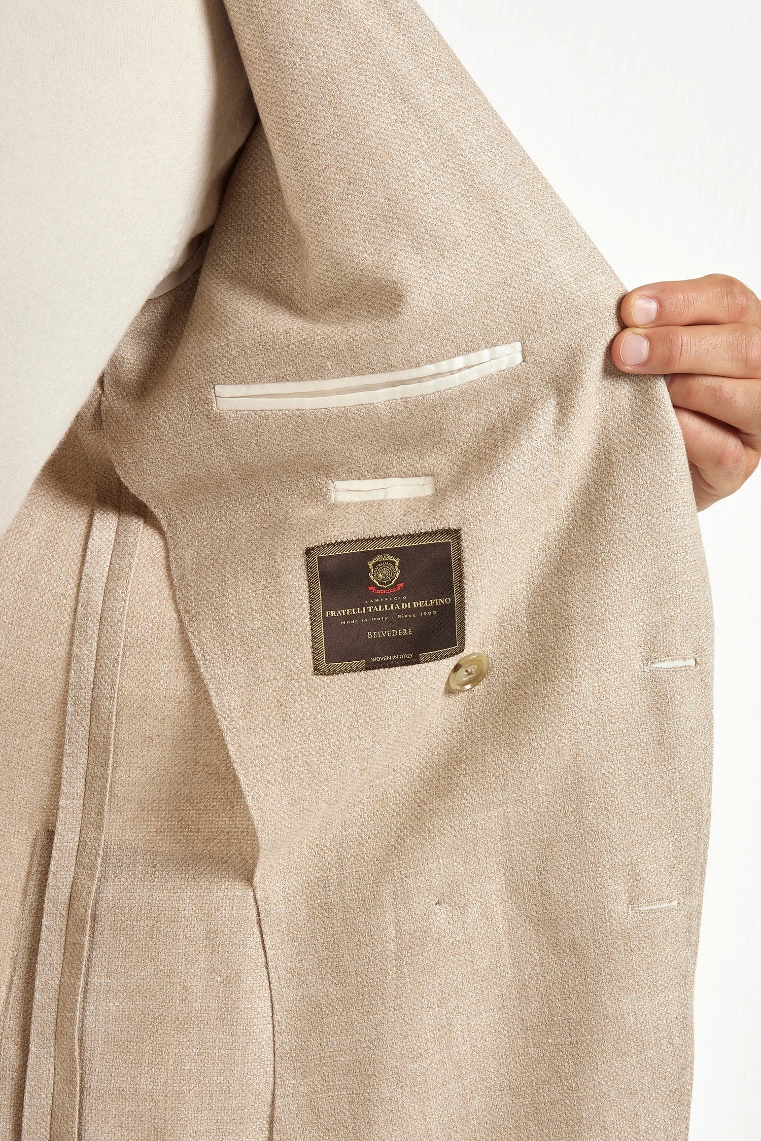Beige double-breasted jacket, Italian style, made in Italy, tailored luxury jacket, elegant menswear blazer, refined casual jacket, premium Italian craftsmanship, classic double-breasted blazer, sophisticated smart casual jacket, versatile layering piece, polished modern jacket, fine Italian tailoring, upscale menswear jacket, timeless Italian blazer, refined professional look, sharp tailored jacket, luxury casualwear, contemporary beige blazer, Italian elegance jacket