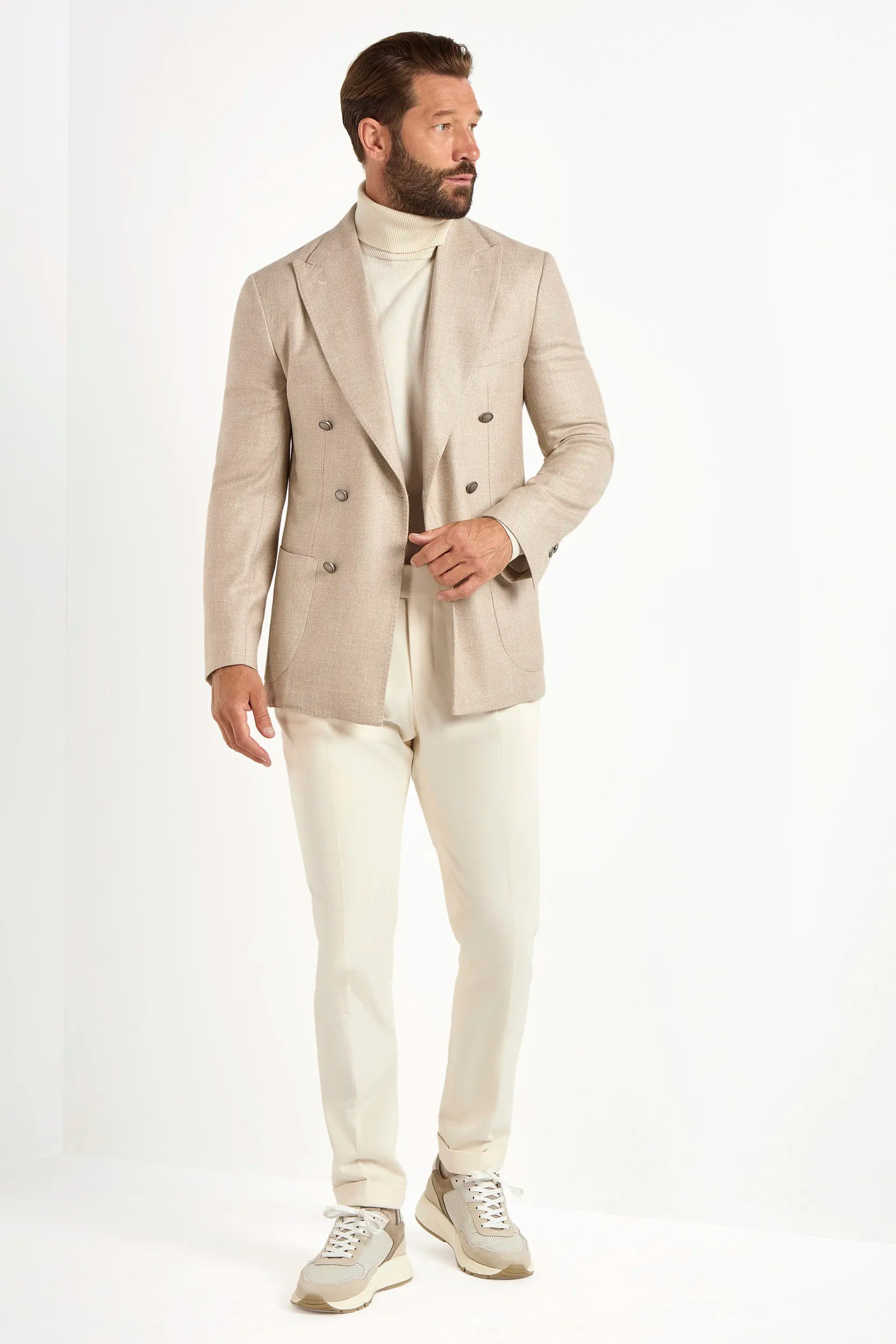 Beige double-breasted jacket, Italian style, made in Italy, tailored luxury jacket, elegant menswear blazer, refined casual jacket, premium Italian craftsmanship, classic double-breasted blazer, sophisticated smart casual jacket, versatile layering piece, polished modern jacket, fine Italian tailoring, upscale menswear jacket, timeless Italian blazer, refined professional look, sharp tailored jacket, luxury casualwear, contemporary beige blazer, Italian elegance jacket