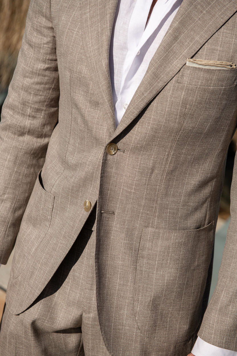 Beige pin stripe suit top (1/2 of set) says L …