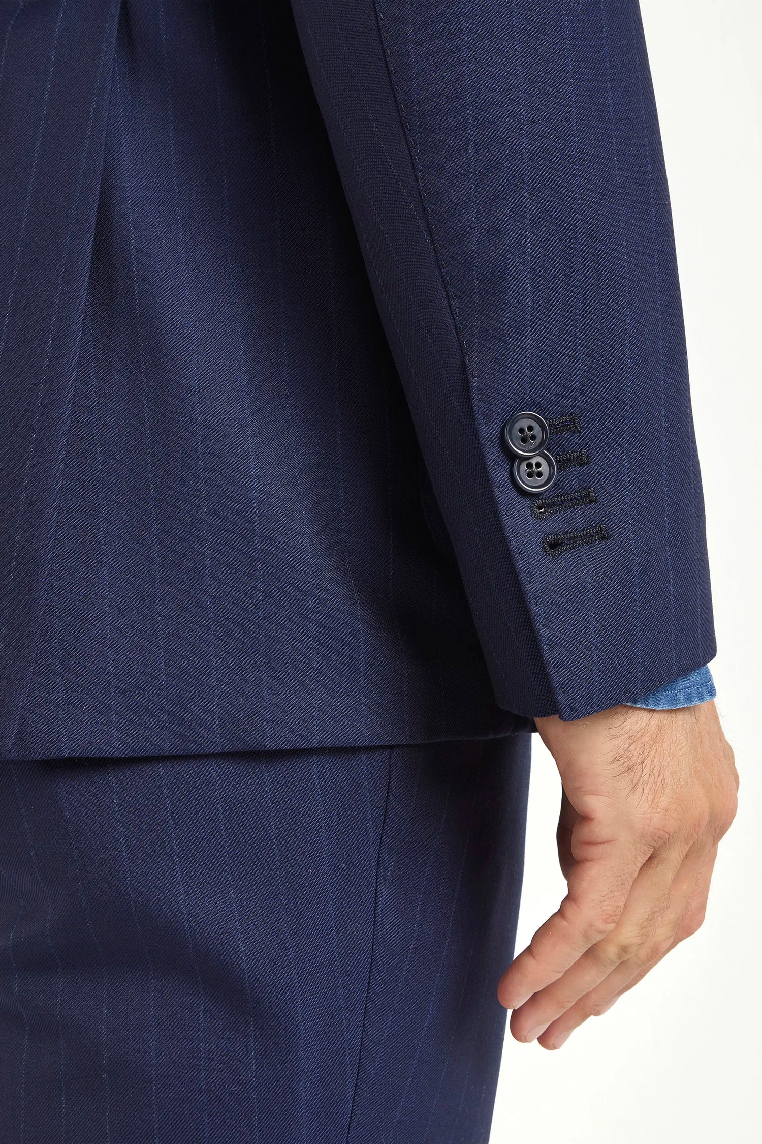 Blue double-breasted striped suit, Italian style, made in Italy, tailored luxury suit, elegant menswear suit, refined formal suit, premium Italian craftsmanship, classic striped suit, sophisticated business suit, smart formal attire, versatile modern suit, polished double-breasted blazer, fine Italian tailoring, upscale menswear suit, timeless Italian suit, refined professional look, sharp tailored suit, luxury office suit, contemporary striped blazer, Italian elegance suit
