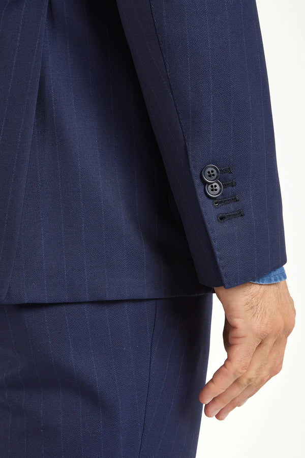 Blue double-breasted striped suit, Italian style, made in Italy, tailored luxury suit, elegant menswear suit, refined formal suit, premium Italian craftsmanship, classic striped suit, sophisticated business suit, smart formal attire, versatile modern suit, polished double-breasted blazer, fine Italian tailoring, upscale menswear suit, timeless Italian suit, refined professional look, sharp tailored suit, luxury office suit, contemporary striped blazer, Italian elegance suit
