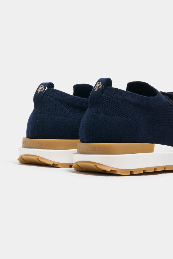 blue knitted sneakers, men's knitted sneakers, italian knit sneakers, blue casual sneakers, luxury men's sneakers, elegant men's sneakers, refined knitted sneakers, tailored blue sneakers, premium italian sneakers, sophisticated men's footwear, timeless italian sneakers, upscale men's sneakers, classic blue sneakers, italian craftsmanship sneakers, premium men's knit sneakers, refined italian sneakers