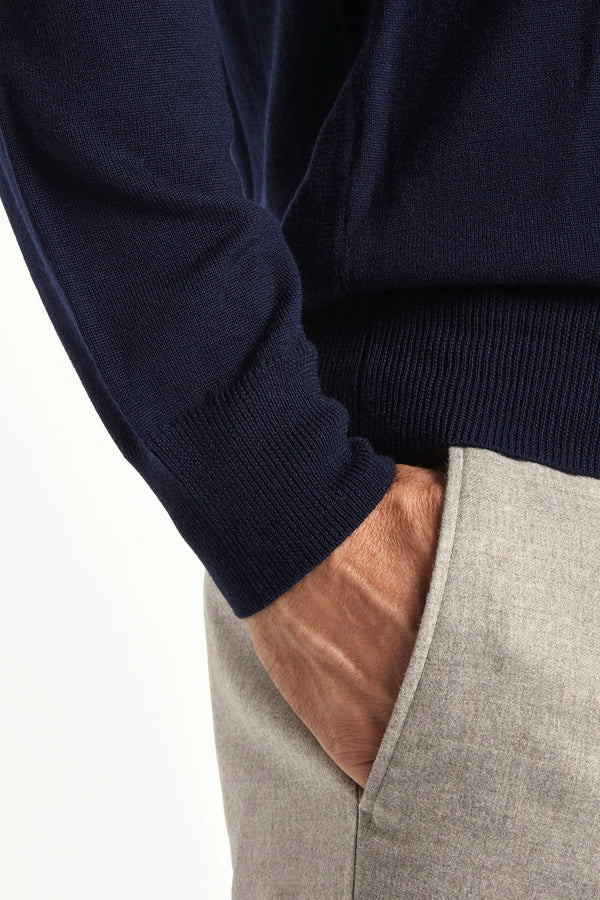 blue merino wool polo, italian style, made in italy, lightweight merino polo, 100% merino wool polo, luxury knit polo, elegant merino shirt, refined menswear polo, premium italian knitwear, smart casual polo, versatile layering polo, fine merino polo, tailored merino polo, breathable wool polo, soft merino knit polo, upscale polo shirt, italian craftsmanship polo, polished knit polo, classic blue merino polo, timeless italian knit
