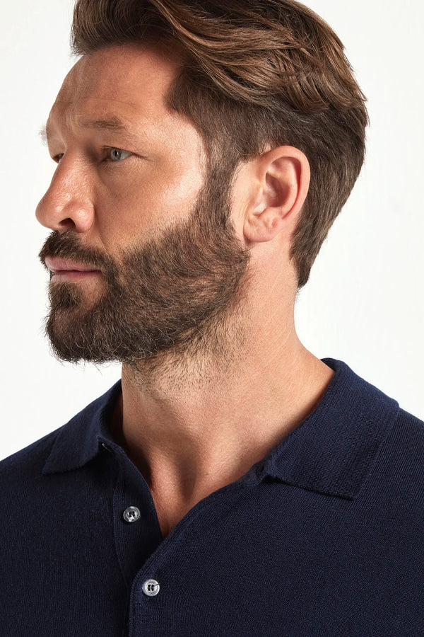 blue merino wool polo, italian style, made in italy, lightweight merino polo, 100% merino wool polo, luxury knit polo, elegant merino shirt, refined menswear polo, premium italian knitwear, smart casual polo, versatile layering polo, fine merino polo, tailored merino polo, breathable wool polo, soft merino knit polo, upscale polo shirt, italian craftsmanship polo, polished knit polo, classic blue merino polo, timeless italian knit