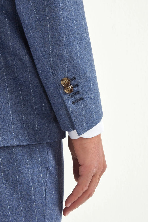 Light blue striped suit, Italian style, made in Italy, tailored luxury suit, elegant menswear suit, refined formalwear, premium Italian craftsmanship, classic striped suit, sophisticated business suit, smart formal attire, versatile modern suit, polished two-piece suit, fine Italian tailoring, upscale menswear suit, timeless Italian suit, refined professional look, sharp tailored suit, luxury office suit, contemporary striped blazer, Italian elegance suit