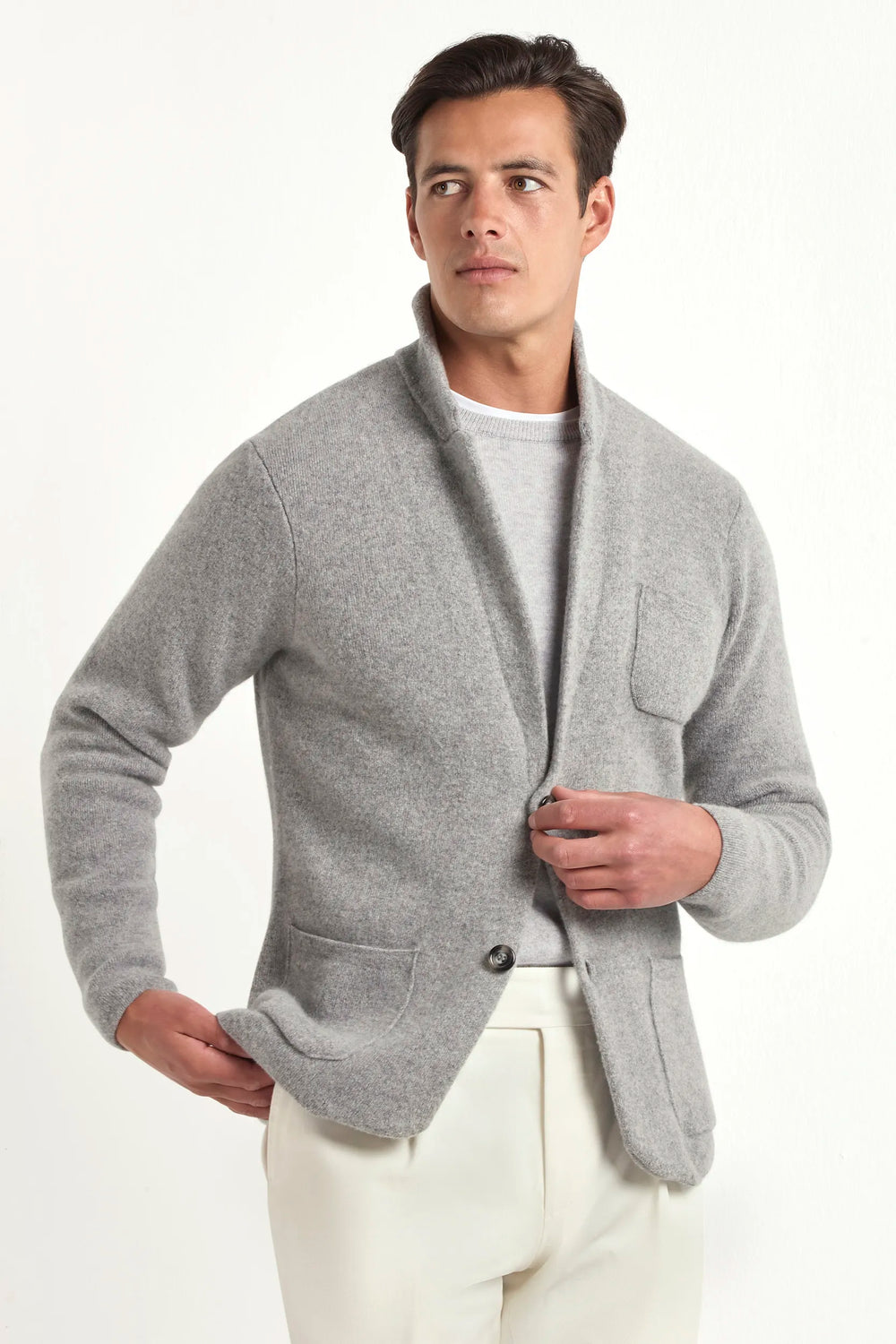 grey knitted jacket, men's knitted jacket, italian wool cashmere jacket, grey knit jacket, luxury men's jacket, elegant men's knitwear, refined knitted jacket, tailored grey jacket, premium italian jacket, sophisticated men's knitwear, timeless italian jacket, upscale men's jacket, classic grey knitwear, italian craftsmanship jacket, premium men's cashmere jacket, refined italian knit jacket