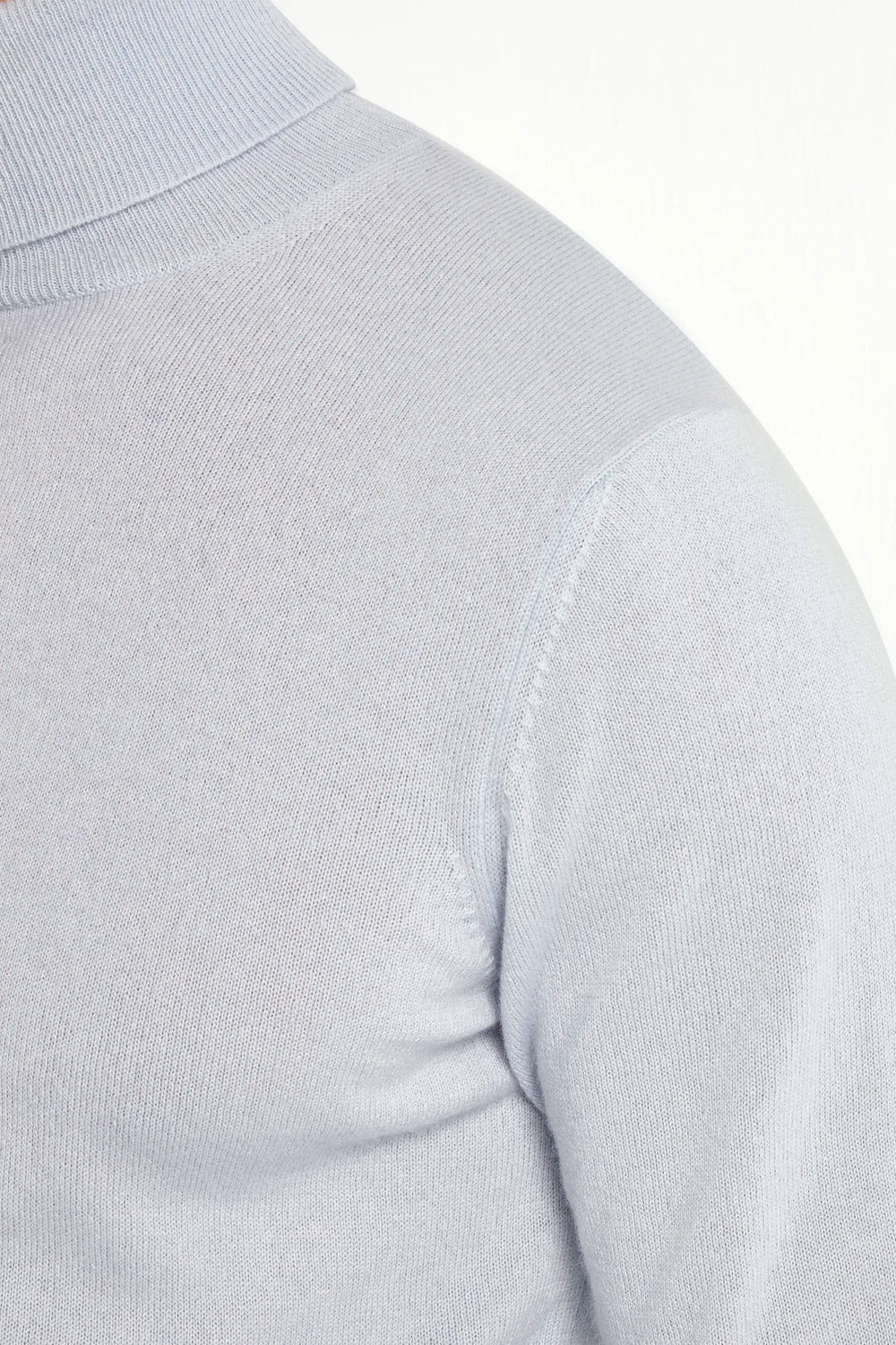 light blue cashmere turtleneck, italian style, made in italy, 100% cashmere turtleneck, luxury cashmere sweater, elegant winter knitwear, refined menswear turtleneck, premium italian sweater, versatile layering turtleneck, fine cashmere knit, tailored cashmere turtleneck, breathable winter sweater, soft cashmere knitwear, upscale cashmere sweater, italian craftsmanship turtleneck, polished winter knit, classic light blue turtleneck, timeless italian sweater, sophisticated cashmere knit, cozy winter cashmere