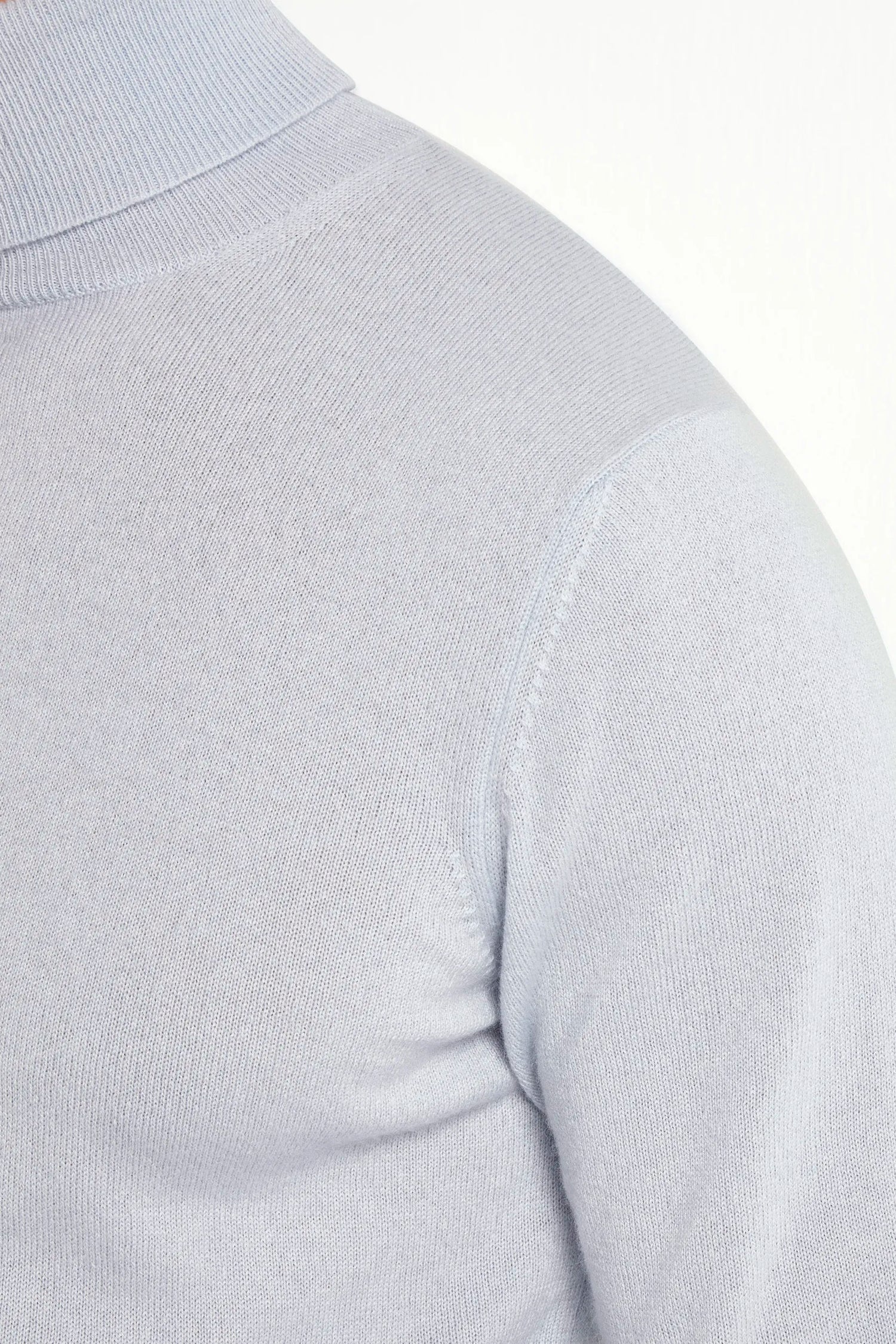 light blue cashmere turtleneck, italian style, made in italy, 100% cashmere turtleneck, luxury cashmere sweater, elegant winter knitwear, refined menswear turtleneck, premium italian sweater, versatile layering turtleneck, fine cashmere knit, tailored cashmere turtleneck, breathable winter sweater, soft cashmere knitwear, upscale cashmere sweater, italian craftsmanship turtleneck, polished winter knit, classic light blue turtleneck, timeless italian sweater, sophisticated cashmere knit, cozy winter cashmere
