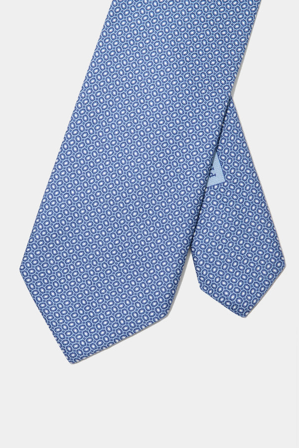 light blue patterned tie, men's patterned tie, italian silk tie, light blue silk tie, luxury men's tie, elegant men's tie, refined patterned tie, tailored light blue tie, premium italian tie, sophisticated men's tie, timeless italian silk tie, upscale men's tie, classic light blue tie, italian craftsmanship tie, premium men's silk tie, refined italian patterned tie