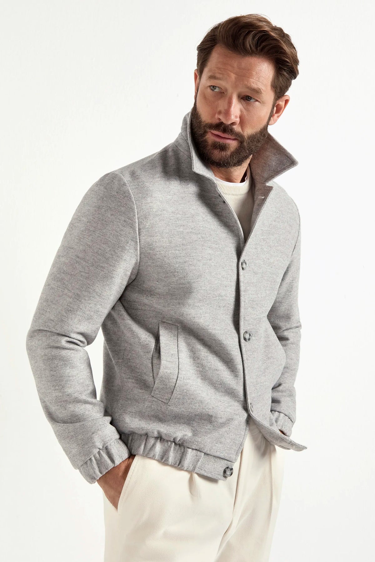 light grey bomber jacket, italian style, made in italy, luxury bomber jacket, elegant menswear jacket, refined casual jacket, premium italian outerwear, versatile bomber, tailored bomber jacket, soft fabric bomber, upscale men's bomber, italian craftsmanship jacket, polished casual outerwear, classic light grey bomber, timeless italian jacket, contemporary bomber design, stylish men's bomber, high-quality bomber jacket, modern italian bomber, sophisticated casual jacket