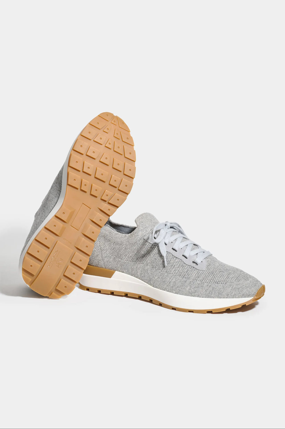 light grey knitted sneakers, men's knitted sneakers, italian knit sneakers, grey casual sneakers, luxury men's sneakers, elegant men's sneakers, refined knitted sneakers, tailored grey sneakers, premium italian sneakers, sophisticated men's footwear, timeless italian sneakers, upscale men's sneakers, classic grey sneakers, italian craftsmanship sneakers, premium men's knit sneakers, refined italian sneakers