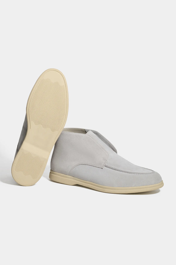 light grey polacchino, men suede polacchino, italian suede loafers, light grey suede loafers, slip-on suede boot, mid-top suede shoe, made in italy polacchino, luxury suede polacchino, elegant suede footwear, refined italian polacchino, premium suede loafers, soft suede ankle boot, versatile suede shoe, handcrafted italian footwear, timeless polacchino design, comfortable suede loafers, upscale suede shoe, italian craftsmanship polacchino, casual luxury footwear, classic light grey suede loafer