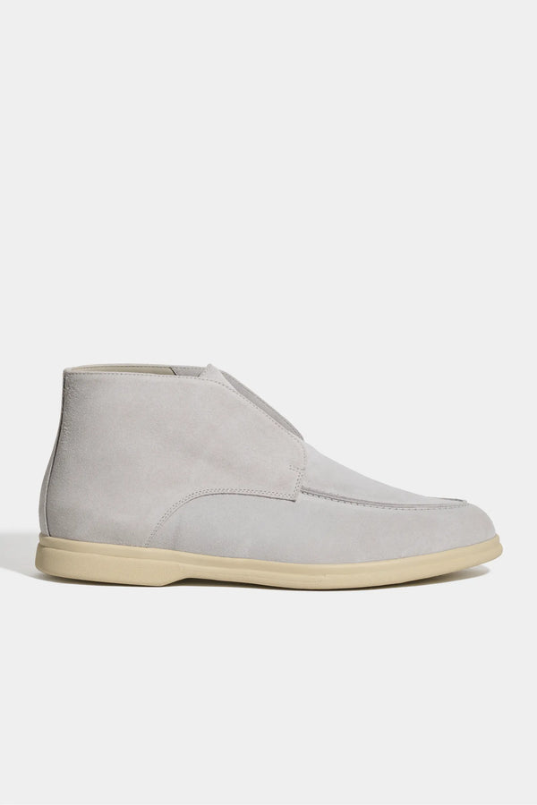 light grey polacchino, men suede polacchino, italian suede loafers, light grey suede loafers, slip-on suede boot, mid-top suede shoe, made in italy polacchino, luxury suede polacchino, elegant suede footwear, refined italian polacchino, premium suede loafers, soft suede ankle boot, versatile suede shoe, handcrafted italian footwear, timeless polacchino design, comfortable suede loafers, upscale suede shoe, italian craftsmanship polacchino, casual luxury footwear, classic light grey suede loafer