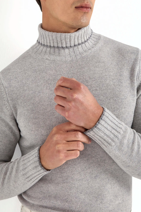 light grey wool turtleneck, italian style, made in italy, fine wool turtleneck, luxury wool sweater, elegant winter knitwear, refined menswear turtleneck, premium italian sweater, versatile layering turtleneck, tailored wool turtleneck, breathable winter sweater, soft wool knitwear, upscale wool sweater, italian craftsmanship turtleneck, polished winter knit, classic light grey turtleneck, timeless italian sweater, sophisticated wool knit, cozy winter wool sweater, lightweight wool turtleneck