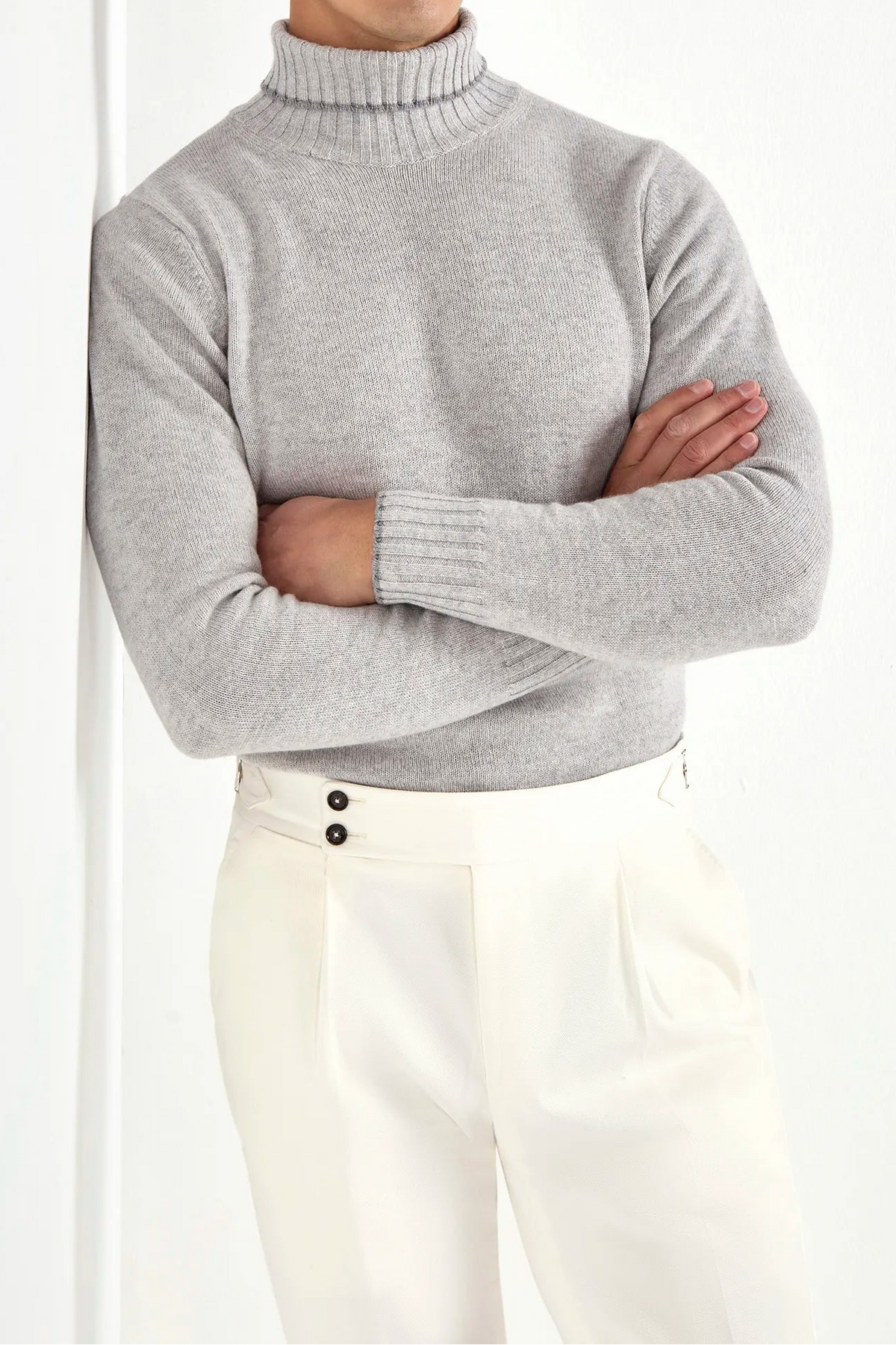 light grey wool turtleneck, italian style, made in italy, fine wool turtleneck, luxury wool sweater, elegant winter knitwear, refined menswear turtleneck, premium italian sweater, versatile layering turtleneck, tailored wool turtleneck, breathable winter sweater, soft wool knitwear, upscale wool sweater, italian craftsmanship turtleneck, polished winter knit, classic light grey turtleneck, timeless italian sweater, sophisticated wool knit, cozy winter wool sweater, lightweight wool turtleneck