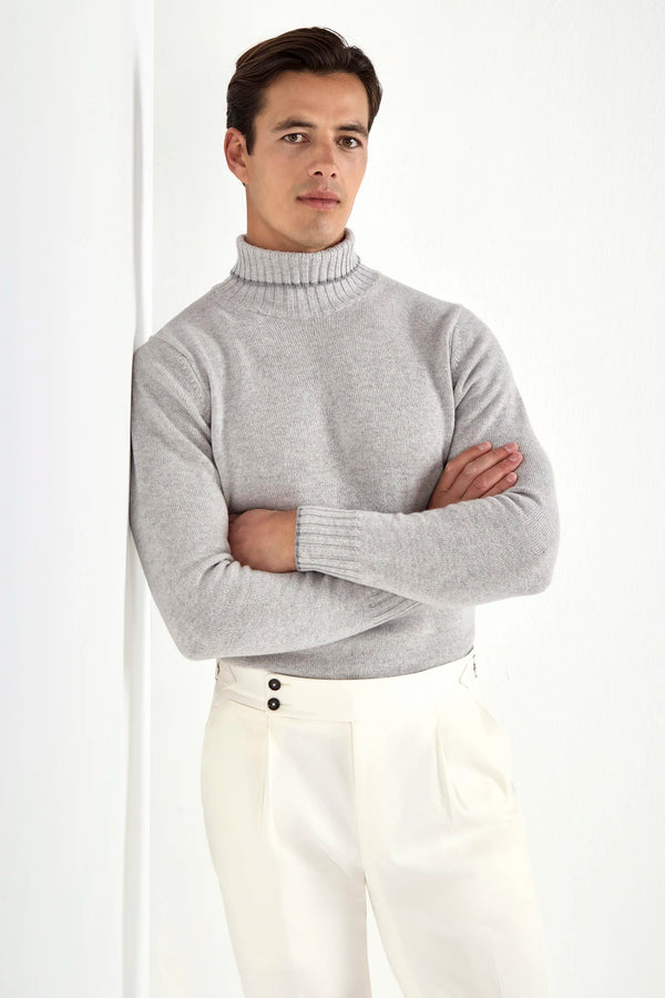 light grey wool turtleneck, italian style, made in italy, fine wool turtleneck, luxury wool sweater, elegant winter knitwear, refined menswear turtleneck, premium italian sweater, versatile layering turtleneck, tailored wool turtleneck, breathable winter sweater, soft wool knitwear, upscale wool sweater, italian craftsmanship turtleneck, polished winter knit, classic light grey turtleneck, timeless italian sweater, sophisticated wool knit, cozy winter wool sweater, lightweight wool turtleneck