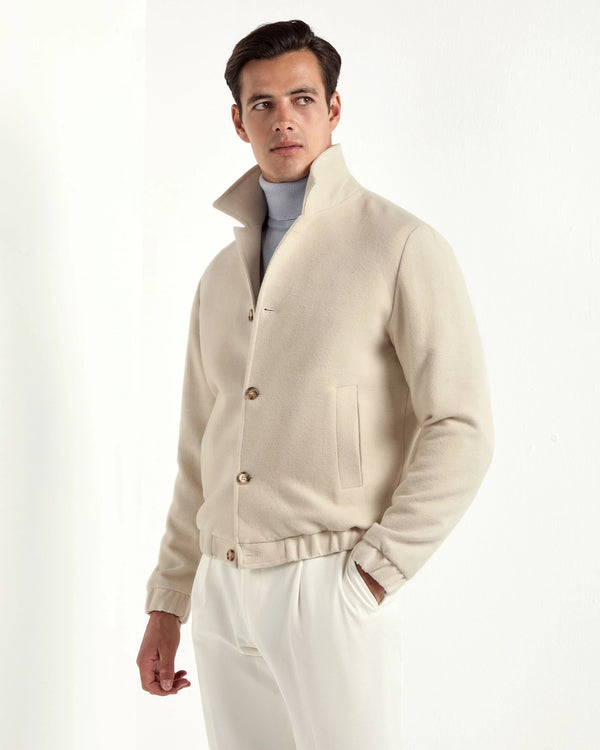 off-white bomber jacket, italian style, made in italy, luxury bomber jacket, elegant menswear jacket, refined casual jacket, premium italian outerwear, versatile bomber, tailored bomber jacket, soft fabric bomber, upscale men's bomber, italian craftsmanship jacket, polished casual outerwear, classic off-white bomber, timeless italian jacket, contemporary bomber design, stylish men's bomber, high-quality bomber jacket, modern italian bomber, sophisticated casual jacket