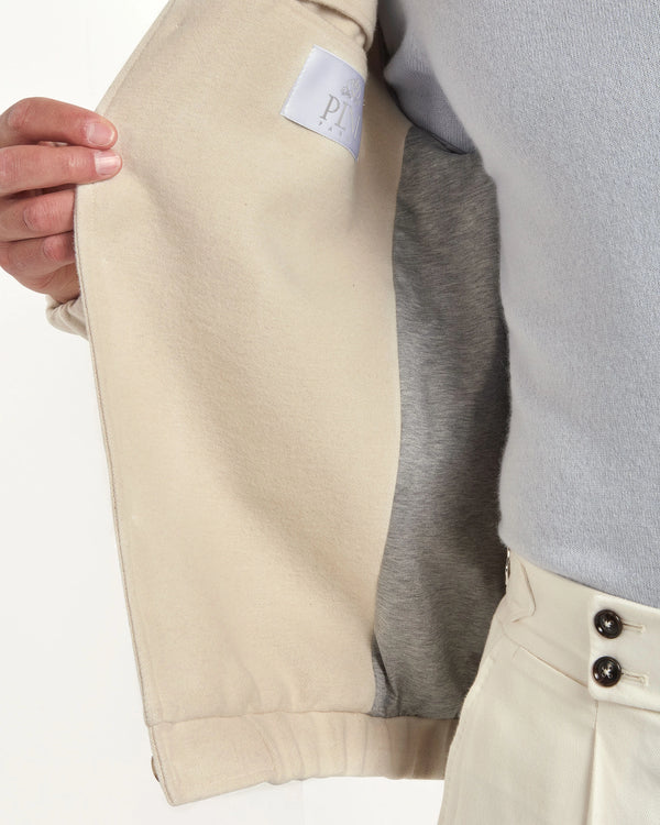 off-white bomber jacket, italian style, made in italy, luxury bomber jacket, elegant menswear jacket, refined casual jacket, premium italian outerwear, versatile bomber, tailored bomber jacket, soft fabric bomber, upscale men's bomber, italian craftsmanship jacket, polished casual outerwear, classic off-white bomber, timeless italian jacket, contemporary bomber design, stylish men's bomber, high-quality bomber jacket, modern italian bomber, sophisticated casual jacket