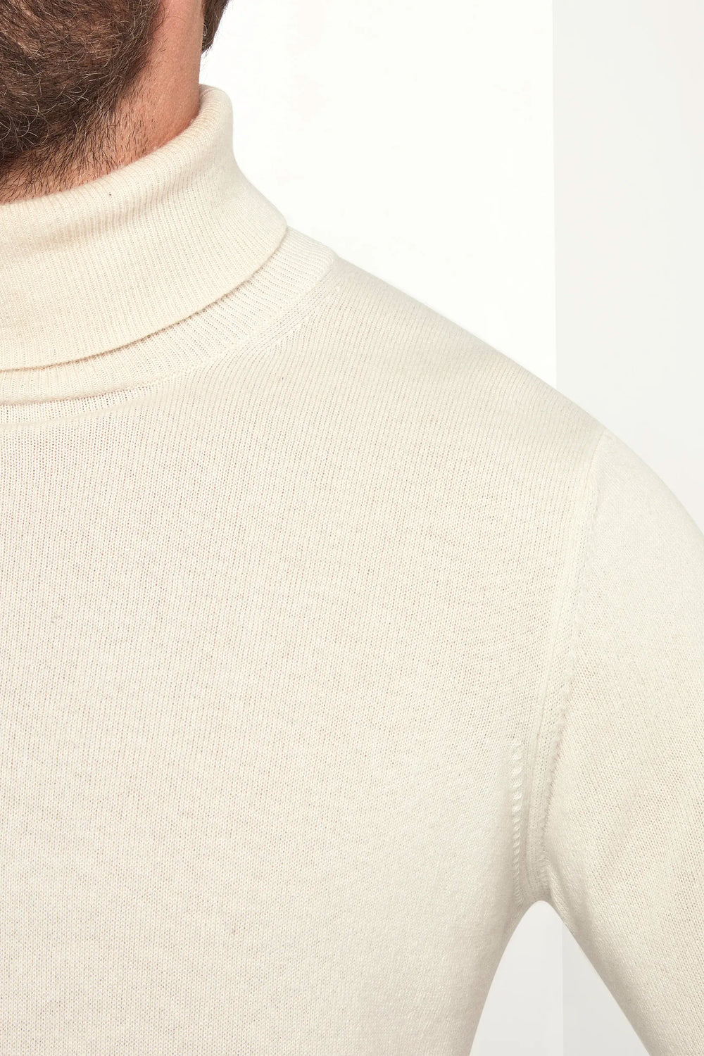 off-white cashmere turtleneck, italian style, made in italy, 100% cashmere turtleneck, luxury cashmere sweater, elegant winter knitwear, refined menswear turtleneck, premium italian sweater, versatile layering turtleneck, fine cashmere knit, tailored cashmere turtleneck, breathable winter sweater, soft cashmere knitwear, upscale cashmere sweater, italian craftsmanship turtleneck, polished winter knit, classic off-white turtleneck, timeless italian sweater, sophisticated cashmere knit, cozy winter cashmere s